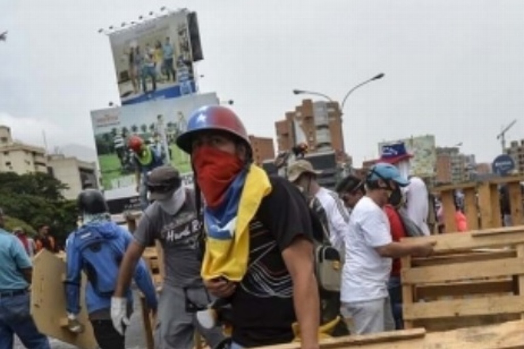 Imagen Venezuela, sumida por ola de saqueos ante desabasto