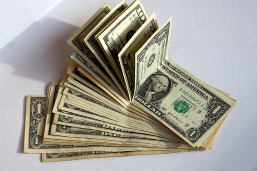 Imagen Venden Dólar en 21.00 pesos en bancos; prevén que peso continúe a la baja