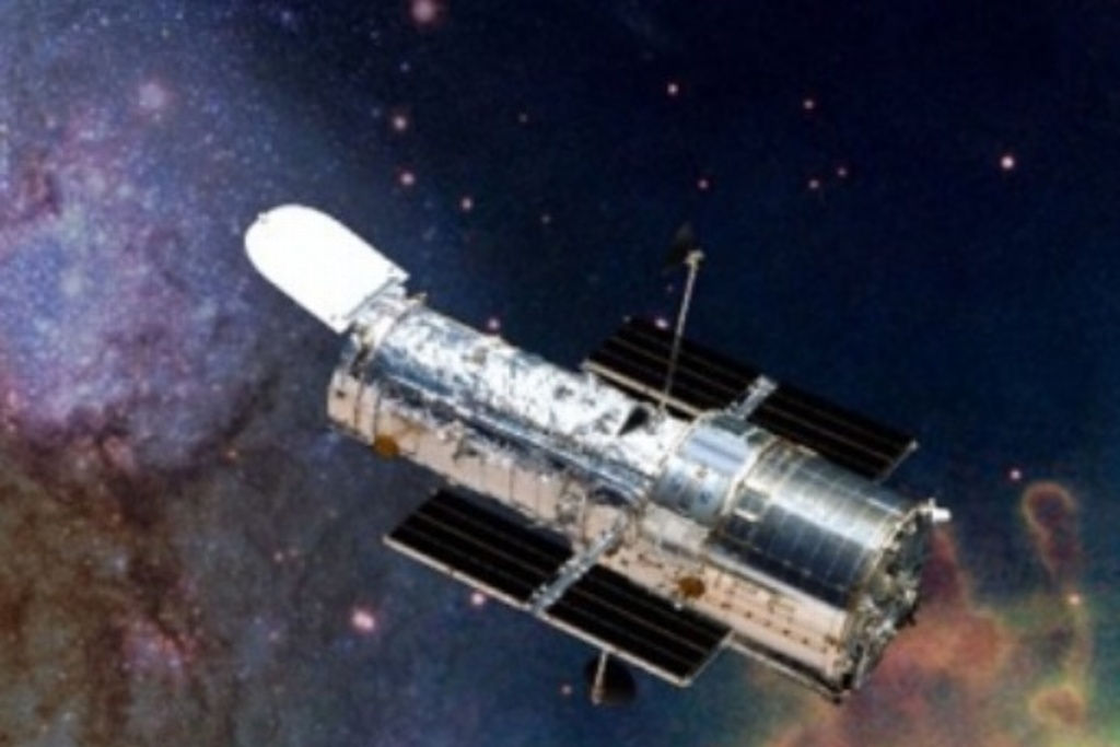 Imagen Nuevo cúmulo de galaxias es fotografiado por Telescopio Hubble