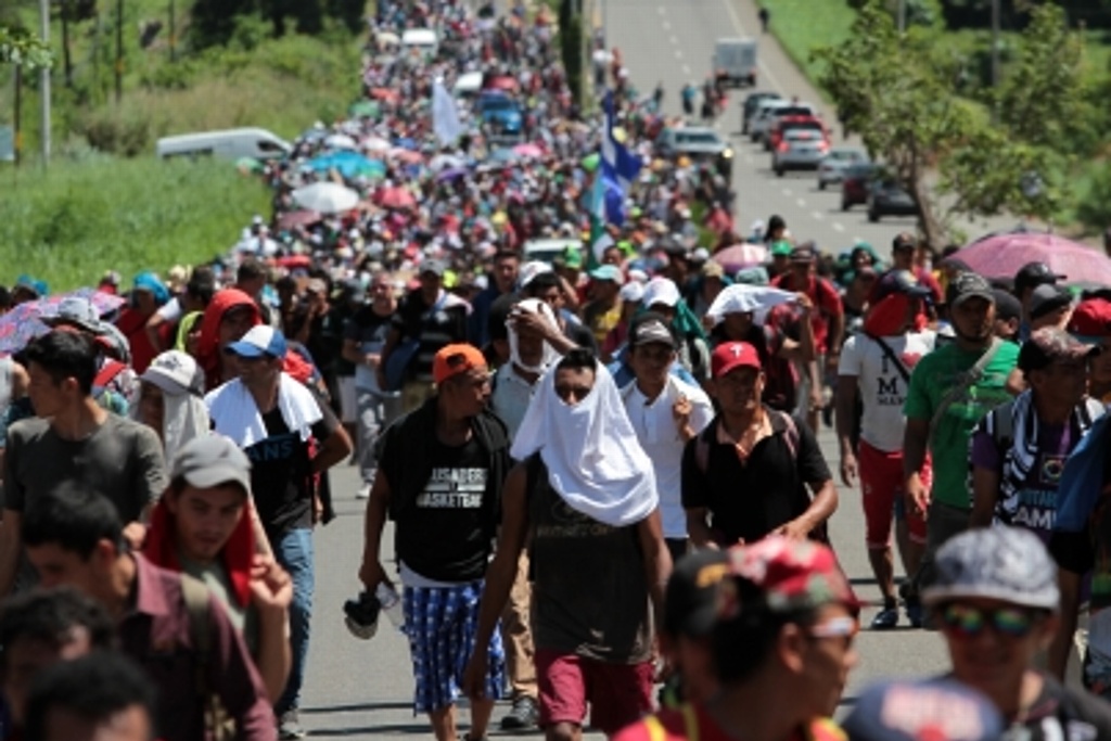 Imagen Detendré con tropas caravana de migrantes centroamericanos:  Donald Trump