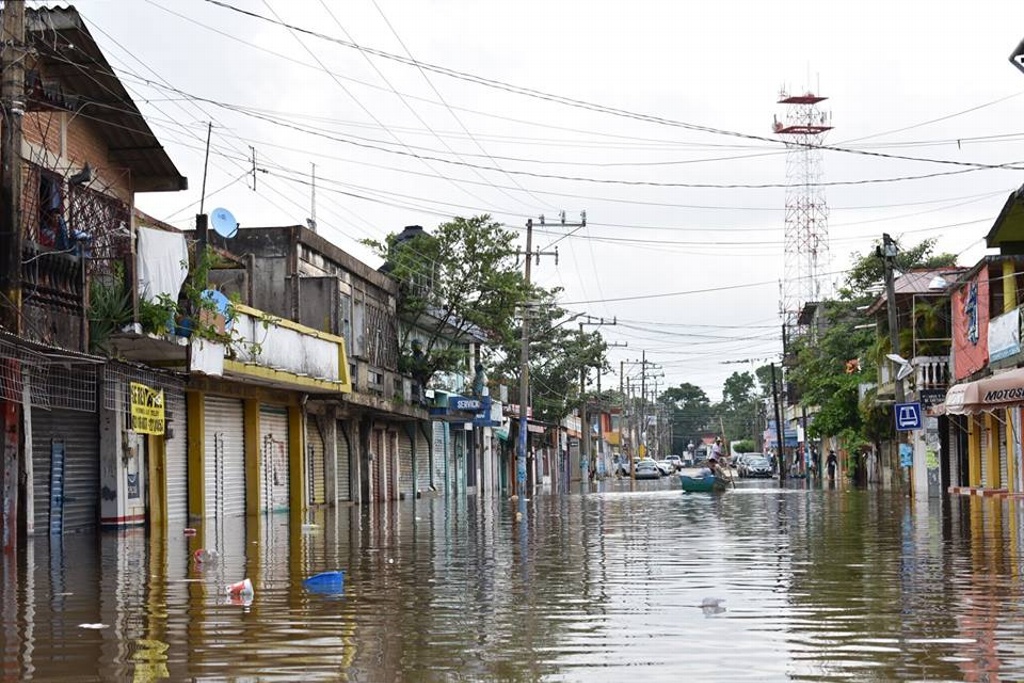Imagen Situación crítica por inundación en Minatitlán y se prevé que empeore: Protección Civil