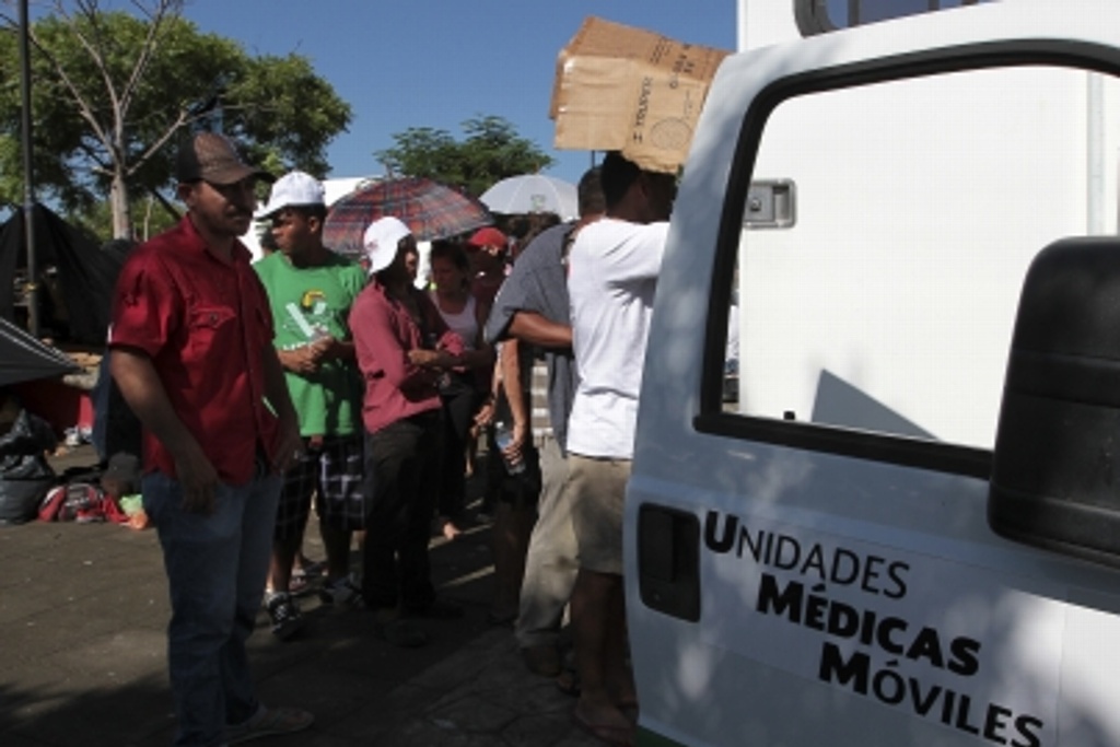 Imagen Regresan voluntariamente 110 migrantes hondureños: Segob 