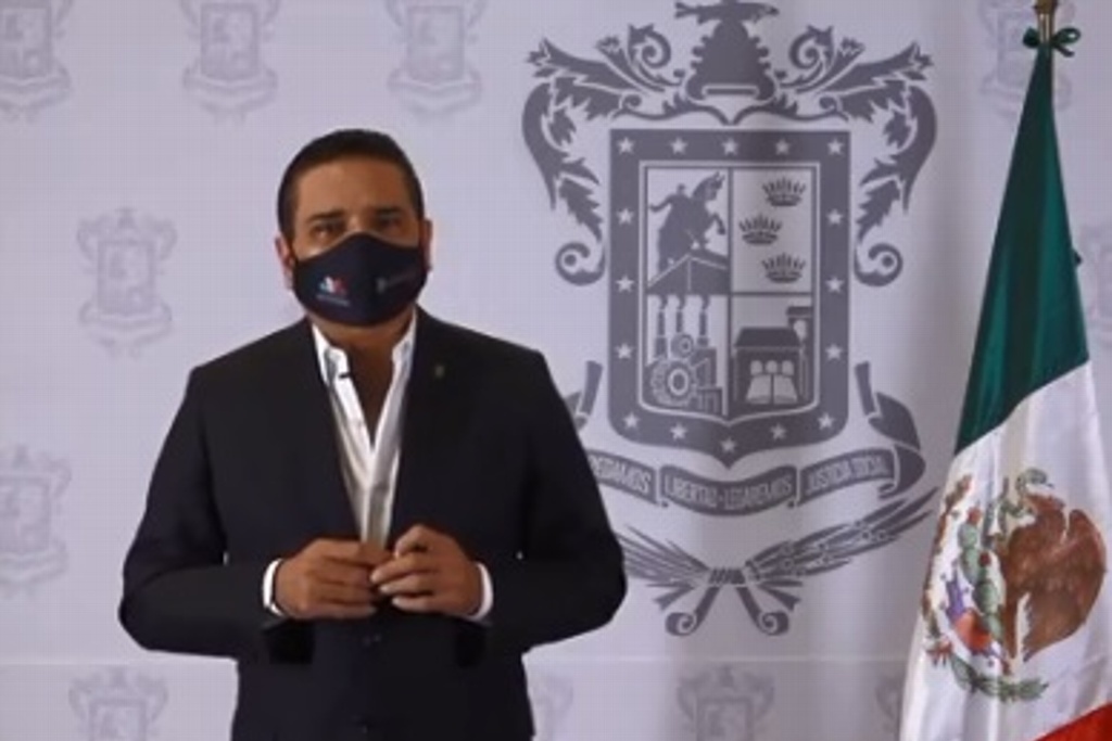 Imagen Captan a gobernador de Michoacán empujando a manifestante en Aguililla (+Video)