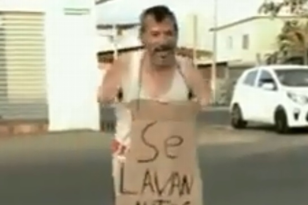 Imagen Perdió sus brazos en accidente y lava autos; su historia conmueve las redes (+Video)