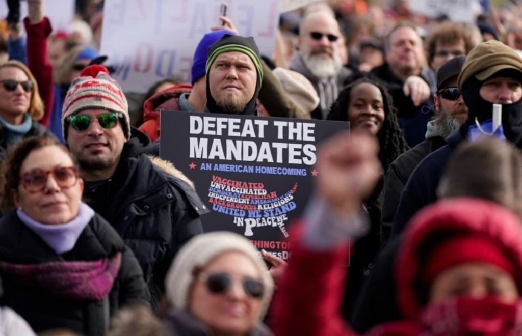 Imagen Miles marchan en Washington contra medidas del COVID-19