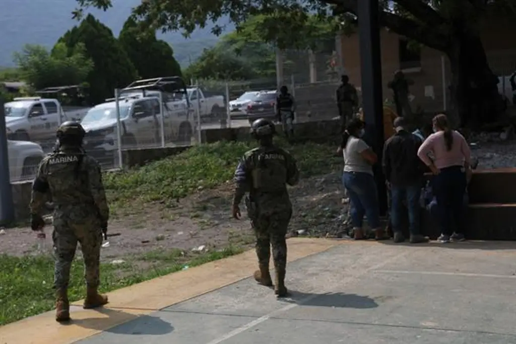 Imagen Suman 17 desaparecidos por control de mina en Michoacán