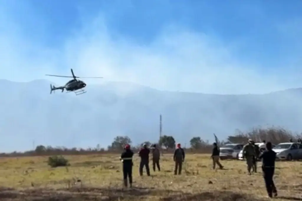 Imagen Evacuan a pobladores de la zona alta de Nogales por incendio forestal 