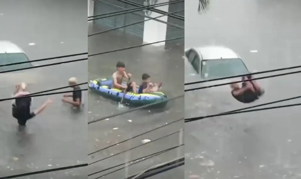 Imagen Jóvenes se echan clavados en calles inundadas en Veracruz (+video) 