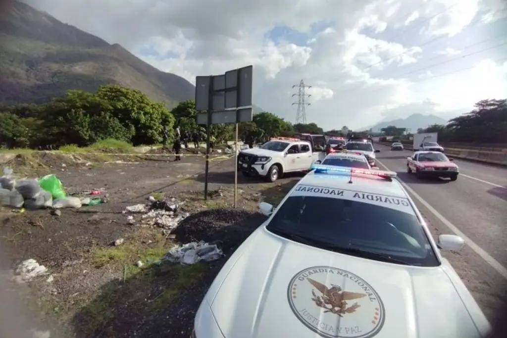 Imagen Hallan a mujer sin vida en autopista de Veracruz; habría sido asesinada a balazos
