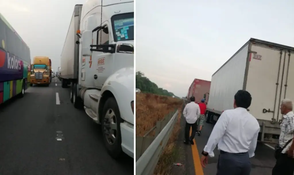 Imagen Caos vial y largas fila de autos por cierre vial en autopista del sur de Veracruz