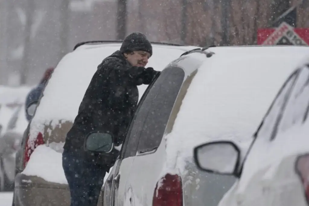 Imagen EU bajo lluvias y nieve en festejos el Día de Acción de Gracias