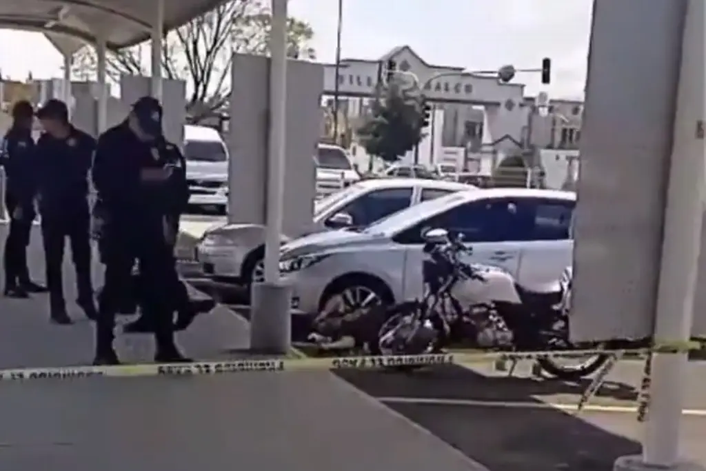 Imagen Balacera en estacionamiento de supermercado deja 2 muertos