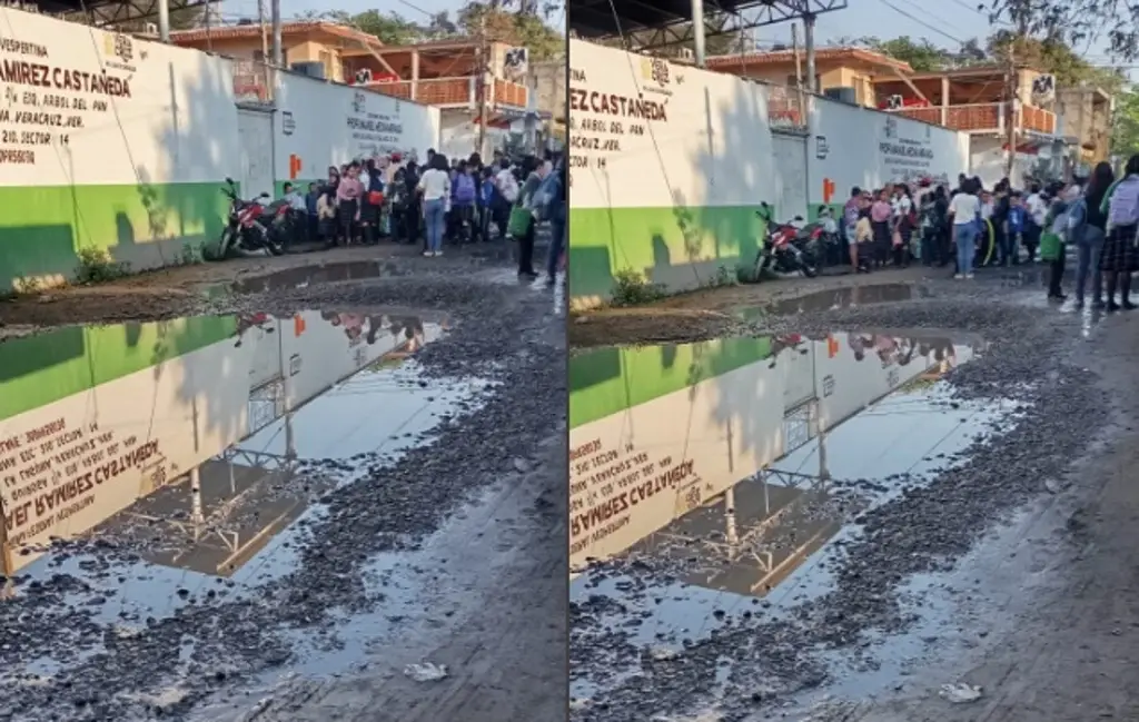 Imagen Piden arreglar calle dañada que afecta a alumnos de escuela, en Veracruz