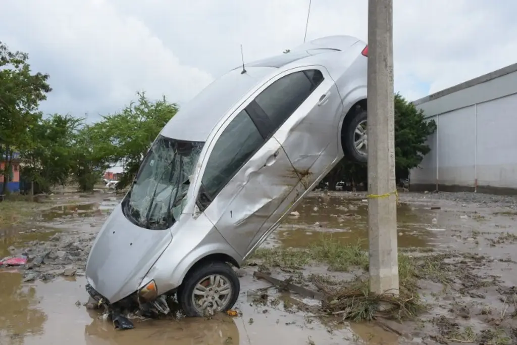 Identificar cuanta cantidad de agua caerá en un fenómeno meteorológico es difícil: Semar