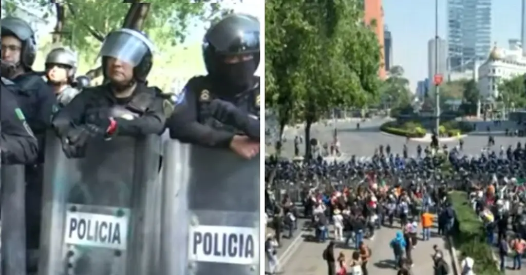 Imagen Valla humana impide paso a marcha sobre Paseo de la Reforma (+Video)
