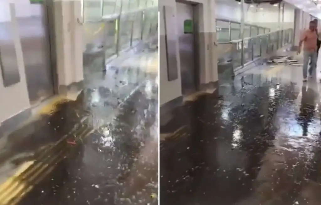 Imagen Así la fuga de aguas negras en pasillo del aeropuerto de CDMX