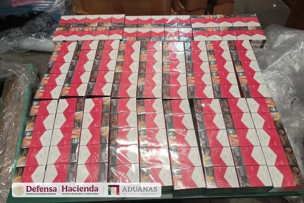 Imagen Decomisan 60 mil cajetillas de cigarrillos ocultas en cargamento proveniente de Bangkok en el AIFA