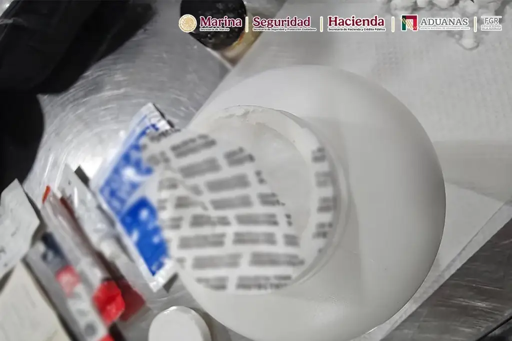 Imagen Aseguran más de 8 mil tabletas con opioide ocultas en frascos de suplementos en el AICM