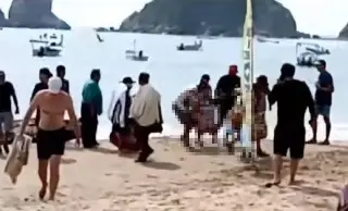 Imagen Mujer muere tras ser atacada por tiburón; salvó a su hijo pequeño (+video)