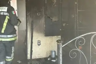Imagen Se registra fuerte incendio al interior de una casa; reportan 2 heridos 