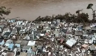 Imagen Rescatan a personas con hipotermia que seguían en casas inundadas en Brasil 