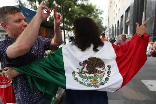 Imagen Mexicanos se preparan para el Día de la Independencia, último gran acto de AMLO