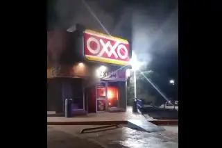 Imagen Incendian y vandalizan casas y tiendas en Culiacán