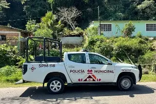 Imagen Cesan a dos policías presuntamente vinculados con muerte de padre buscador de Papantla