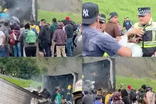 Imagen Se incendia tráiler en carretera de Veracruz; intentan acto de rapiña 