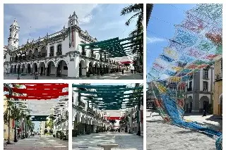 Imagen Ponen pabellón verde, blanco y rojo en el zócalo de Veracruz; quitan tapete aéreo multicolor 