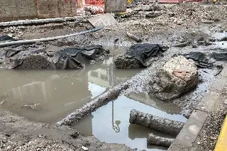 Imagen Bajó el agua en avenida Independencia y esto quedó al descubierto…