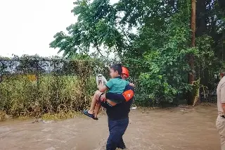 Imagen Siguen los rescates en estas localidades de Tuxpan, Álamo y Poza Rica: SSP