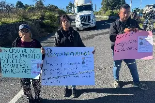 Cierran carretera Xalapa-Perote por madre e hijo desaparecidos hace 3 días