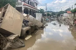 Imagen Aún hay 12 comunidades incomunicadas tras inundaciones en Veracruz; avanza limpieza