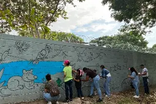 Pintan mural en zona de Laguna Ensueño en Veracruz, buscan concientizar 