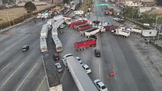 Realizan paro nacional anunciado por transportistas