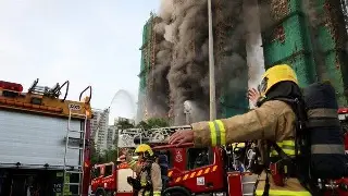 Mueren al menos 13 personas en incendio de rascacielos en Hong Kong (+Video)