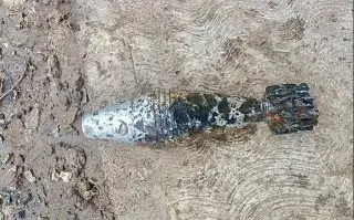 Hallan presunta granada de mortero entre desechos por inundación en Poza Rica 