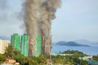 Imagen Suben a 128 muertos y 200 desaparecidos por incendio en edificios de Hong Kong