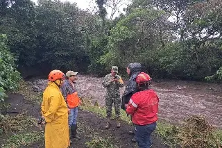Imagen Realizan monitoreo permanente tras desbordamiento de río en Catemaco, Veracruz
