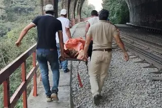 Rescatan cuerpo de Uriel, arrastrado tras clavado en río Atoyac