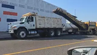 Inician reencarpetado de carretera Veracruz-Medellín de Bravo; tome precauciones 