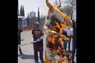 Manifestantes en México queman figura del dios Baal y exigen la paz en Oriente Medio