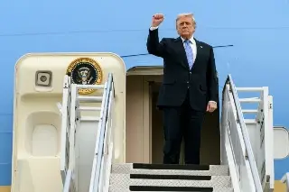 Trump abandona Pekín levantando el puño: fue una visita increíble (+Video)