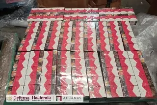 Decomisan 60 mil cajetillas de cigarrillos ocultas en cargamento proveniente de Bangkok en el AIFA