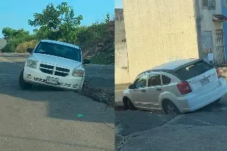 Conductor cae en una zanja por obra inconclusa en el fraccionamiento Palma Real, en Veracruz