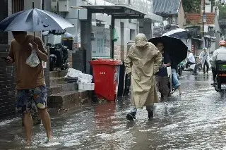 China cancela vuelos y cierra áreas turísticas antes de la llegada del tifón Bavi