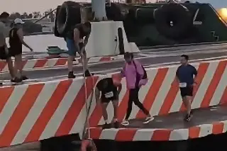 Corredora cae al agua en Malecón de Veracruz 