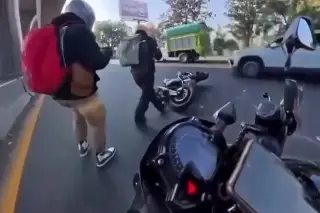 Impactada por otro motociclista que se acercó para pedirle perdón (+Video)