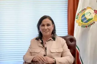 Nahle niega vínculos de su esposo con delincuentes y exige disculpa pública